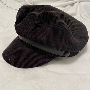 Lulu’s black corduroy baker boy hat